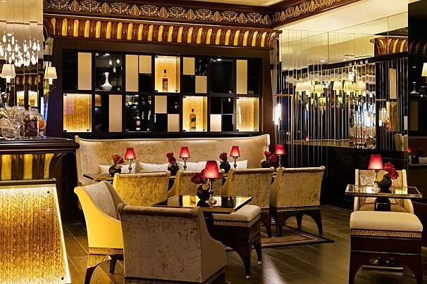 A room with a lot of chairs and tables