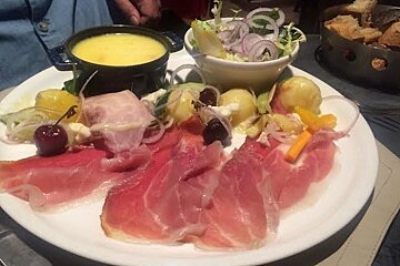 a small fondue and side dishes