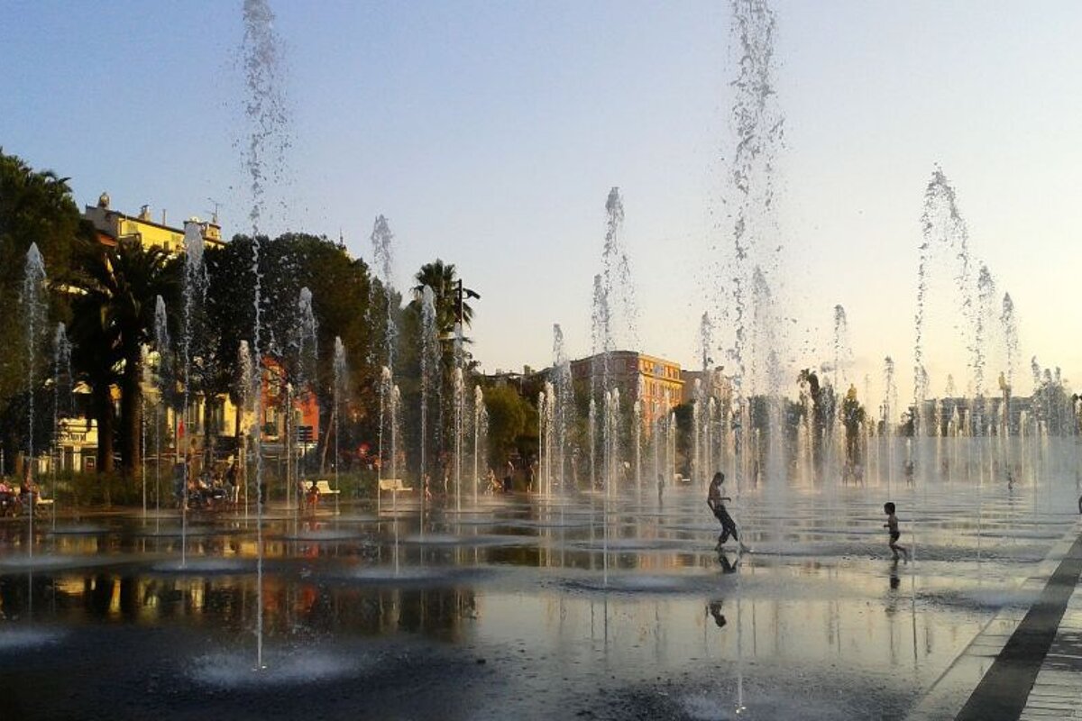 Kids playing in the fountains in Nice