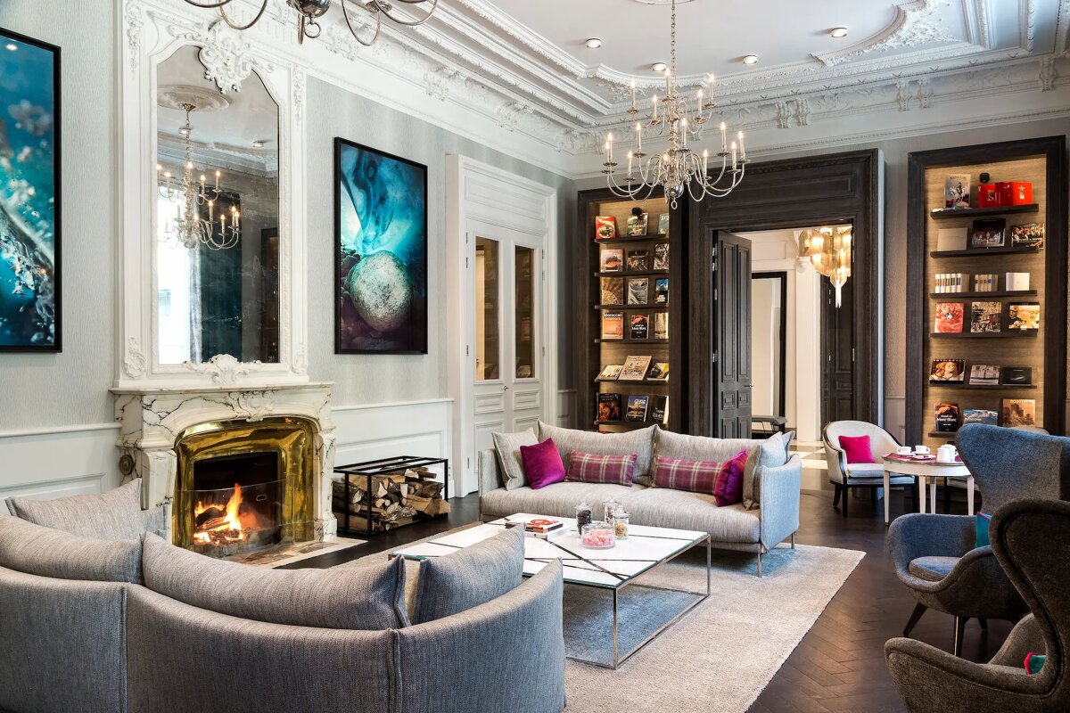 A living room filled with furniture and a fireplace