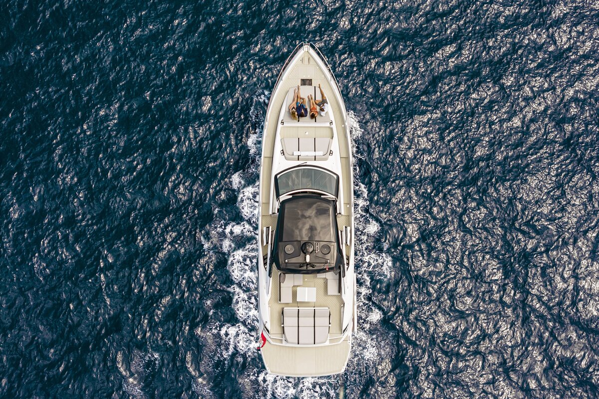 An aerial view of a boat in the ocean