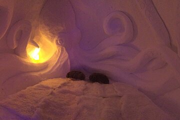 a snow carving of an octopus