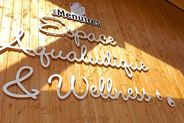 the sign at a spa and wellness centre in les menuires