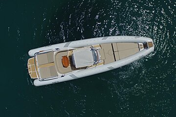 An aerial view of a boat that says elite on the side