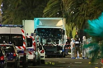 a bullet hole ridden truck