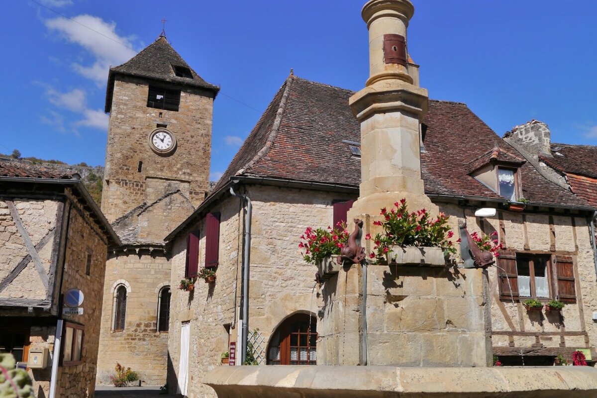 the fountain & church tower in autoire