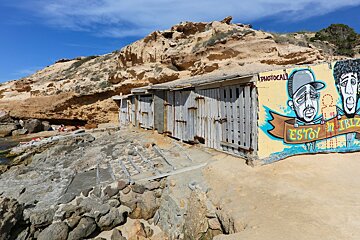 artwork on a wall at cala conta ibiza