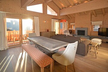 a modern lounge in a chalet in verbier