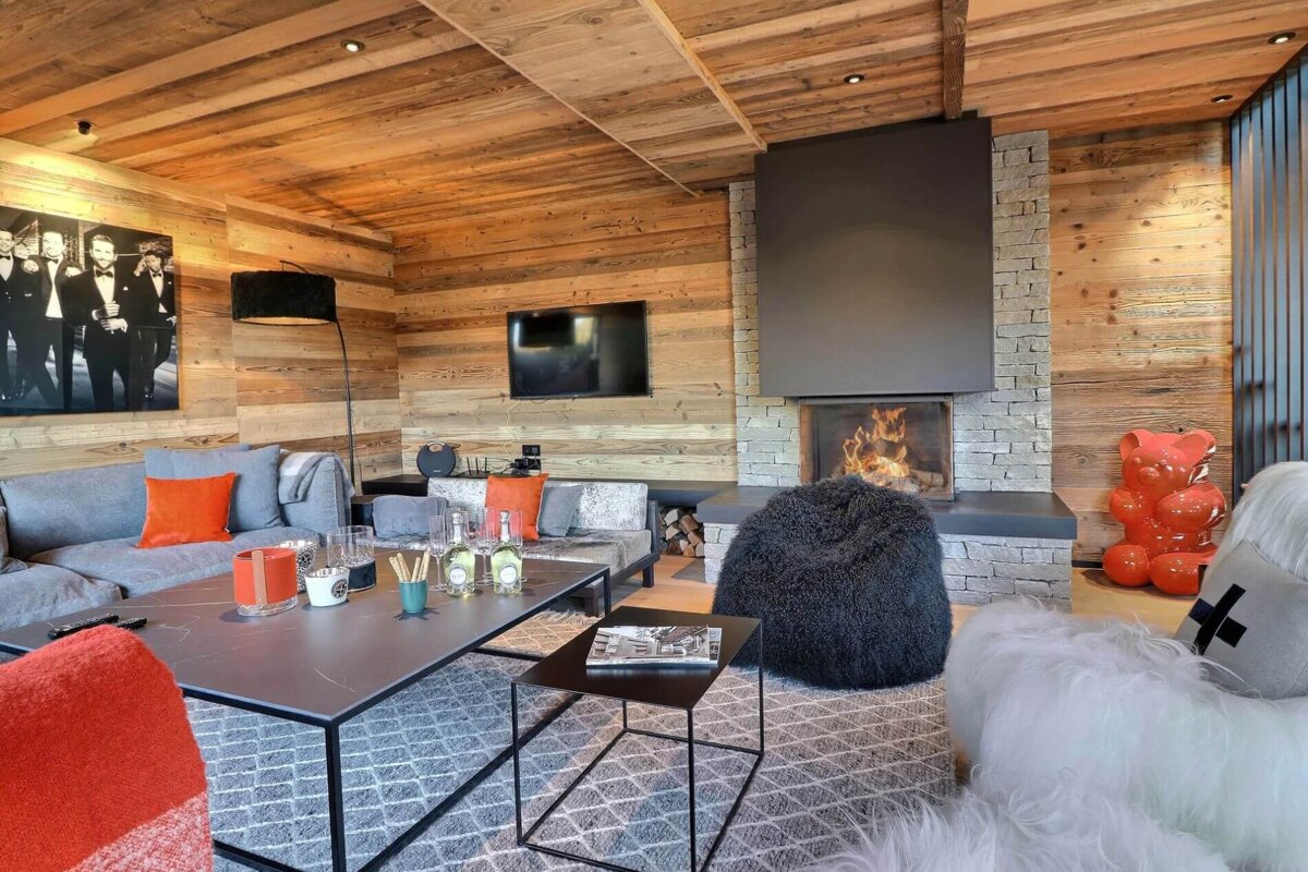A living room with a fireplace and a couch