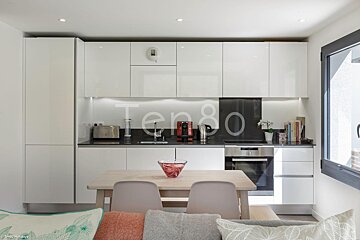 A kitchen with the word ten80 on the wall