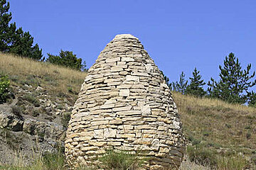a stone pile on a trail in Provence