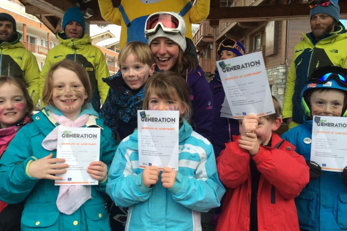children with their skiing certificates