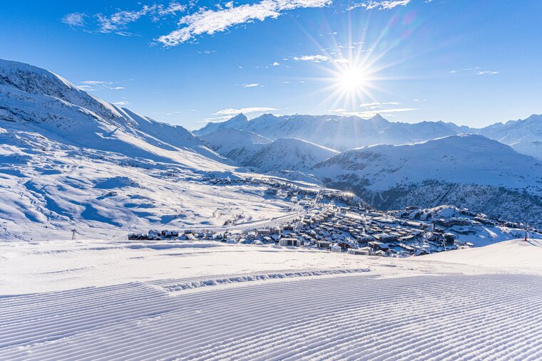 Alpe d'Huez on the snowy piste on a sunny day in winter