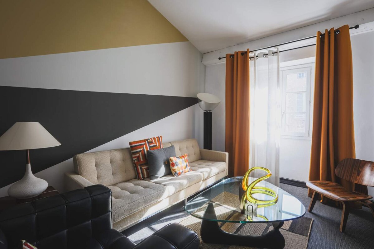 A living room with a couch and a coffee table