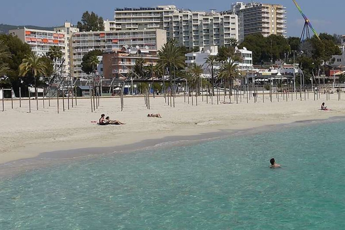 a man swimming in the sea in Mallorca