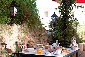 A table with a variety of food and drinks on it
