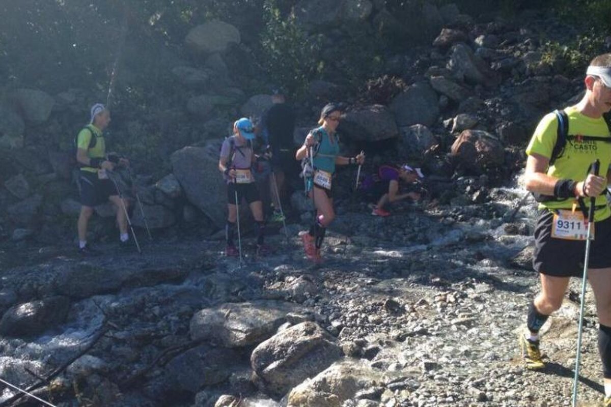 A man in a yellow shirt with the number 9311 on it