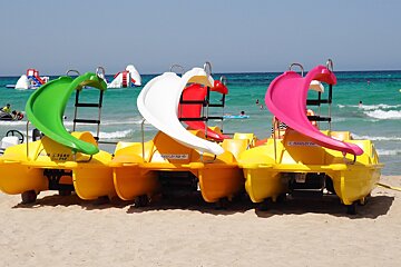 pedal boats with slides ready to hit the waves