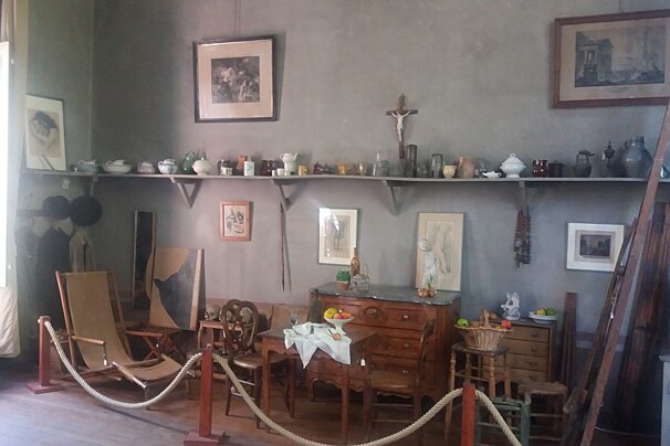 an old room with artists furniture