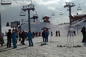 lots if instructors chatting to clients near the chair lifts