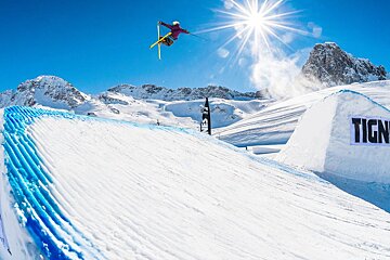 a freestyle skier on a big jump