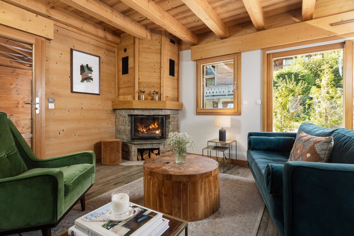 A living room with a fireplace and a couch