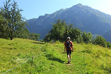 An image of a hiker in the Alps