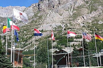flags flying in val disere in summer