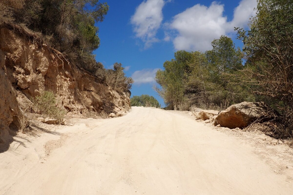 a dust road in the west coast of ibiza near cala salada