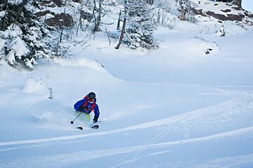 a skier in deep snow