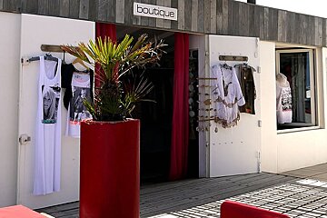 front of a boutique selling beach wear