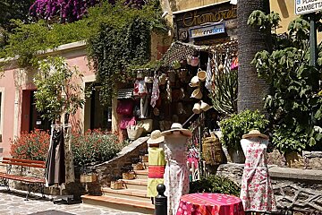 front of a boutique selling beach wear