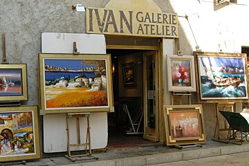 exterior of a small gallery selling colourful art