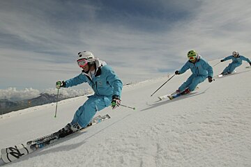 a ski instructor giving a group lesson
