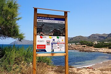 a sign at a beach in mallorca
