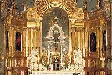 a gilded altar in a cathedral