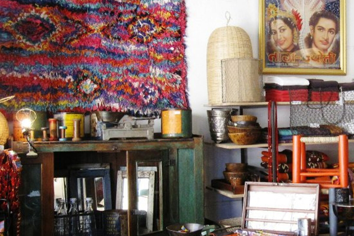 an eclectic mix of items for sale in a shop in anitbes