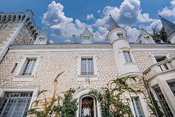 A large stone building with a tower on top of it