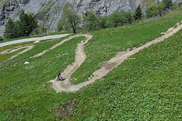 a mountain biker on a trail in chamonix le tour