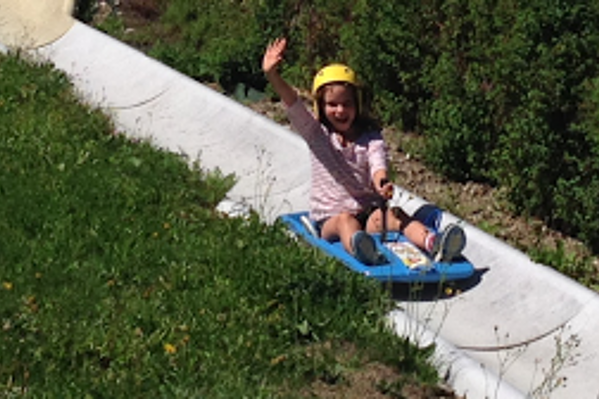 a girl on the summer luge in morzine