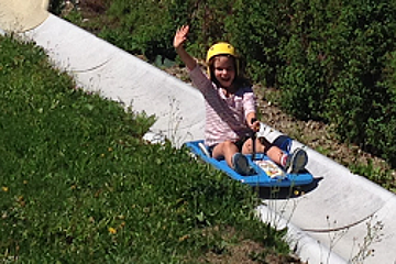 a girl on the summer luge in morzine