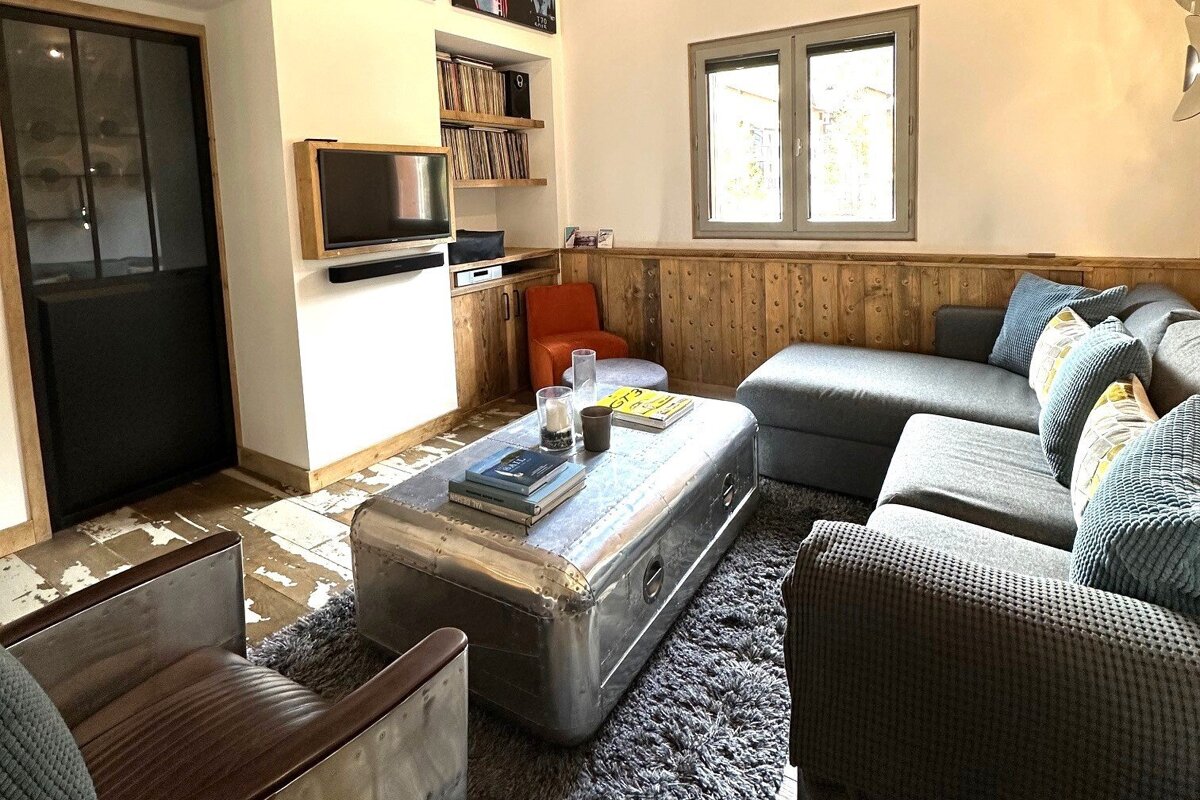 A living room with a couch and a coffee table