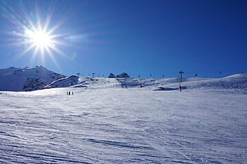 a wide piste in courchevel