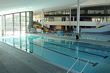 large indoor swimming pools with lane markers
