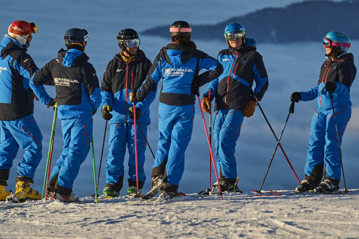 a group of ski and snowboard instructors