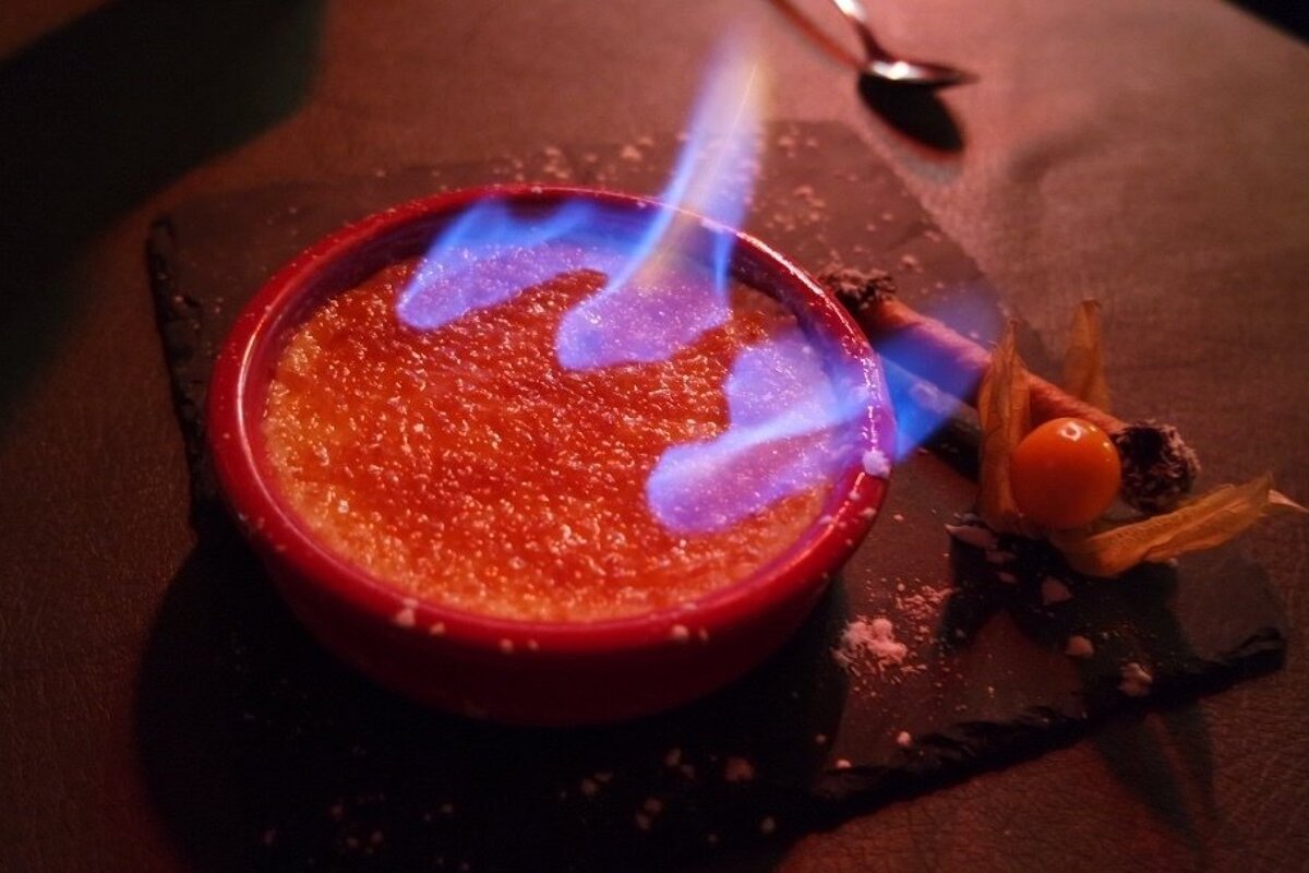 a brulee dessert on fire