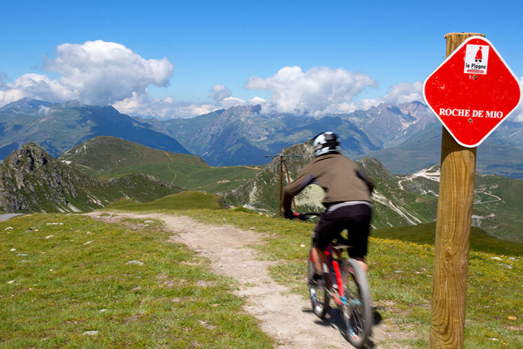 a female mountain biker in la plagne