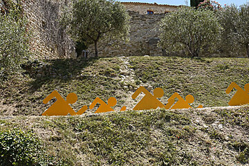 sculptures of people running