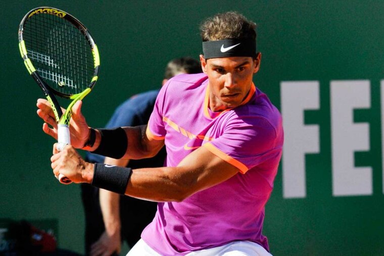 Rafael Nadal in pink shirt at monte carlo masters 2017