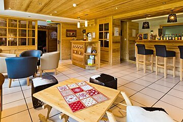 A room with a table that has a pattern on it